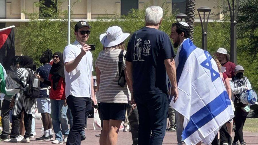 A counter-protester wears an Israeli flag during a pro-Palestine rally at ASU, April 26, 2024